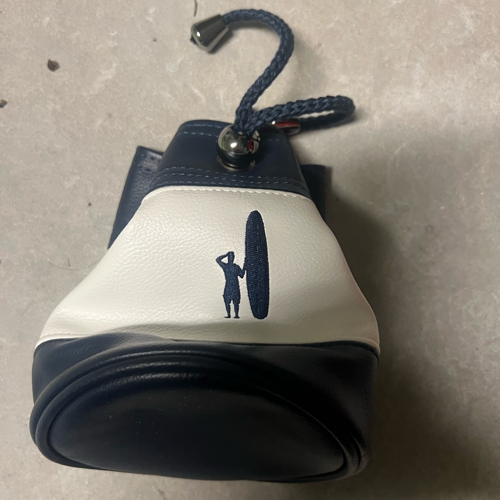 Leather pouch surfer with surf board with drawstring